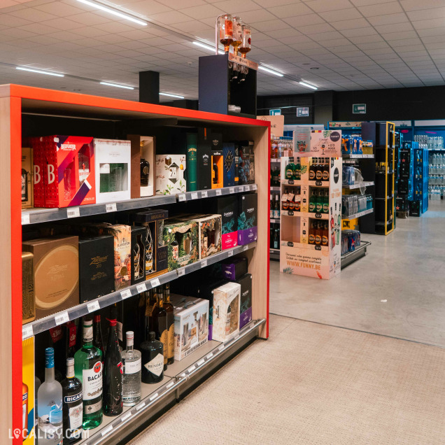 Présentation centrale de Grimbergen chez Brasserie Maziers à Marche-en-Famenne, magasin de boissons.